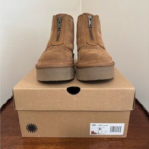 UGG boots. Zip front platform boots.